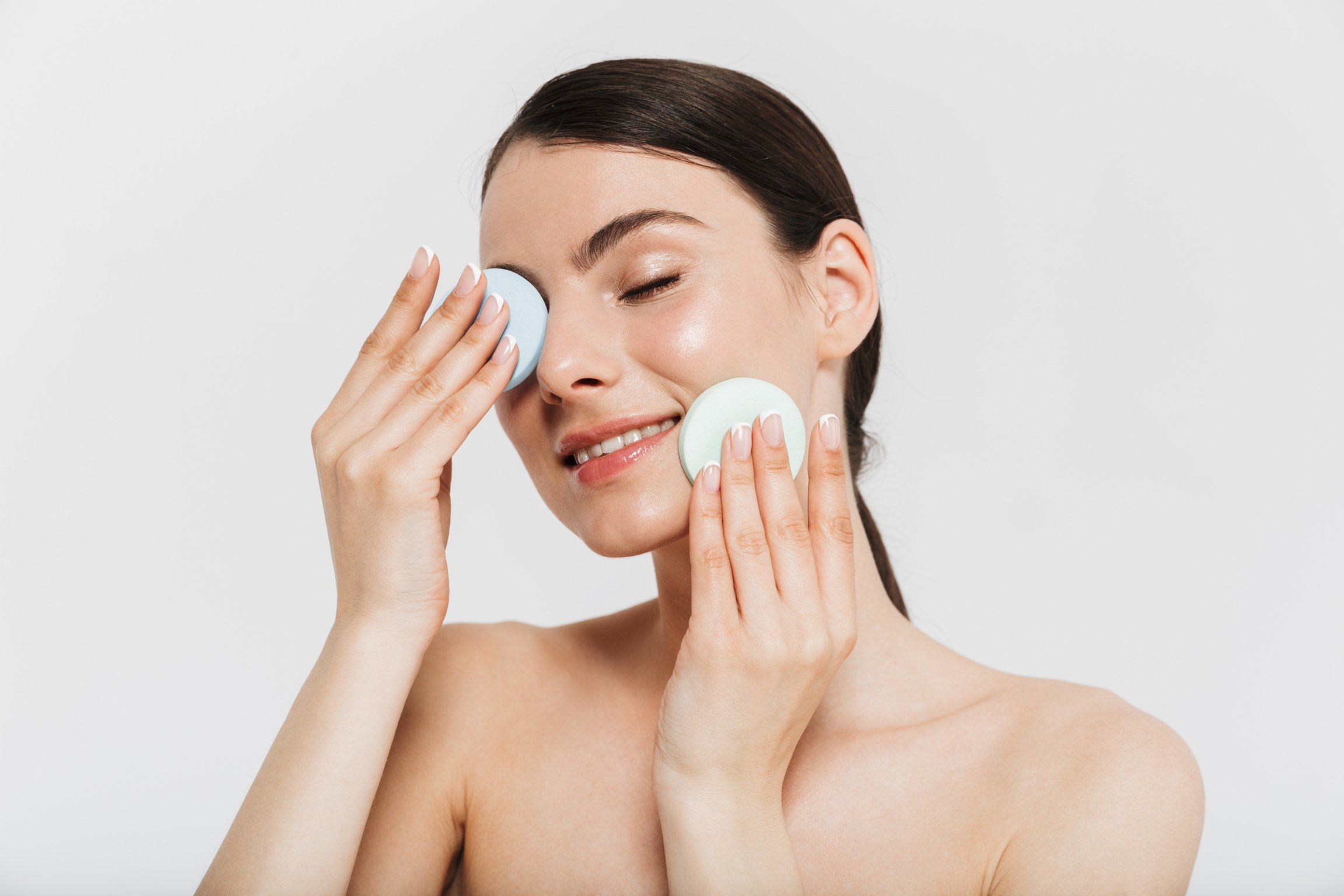 Woman Applying Skincare