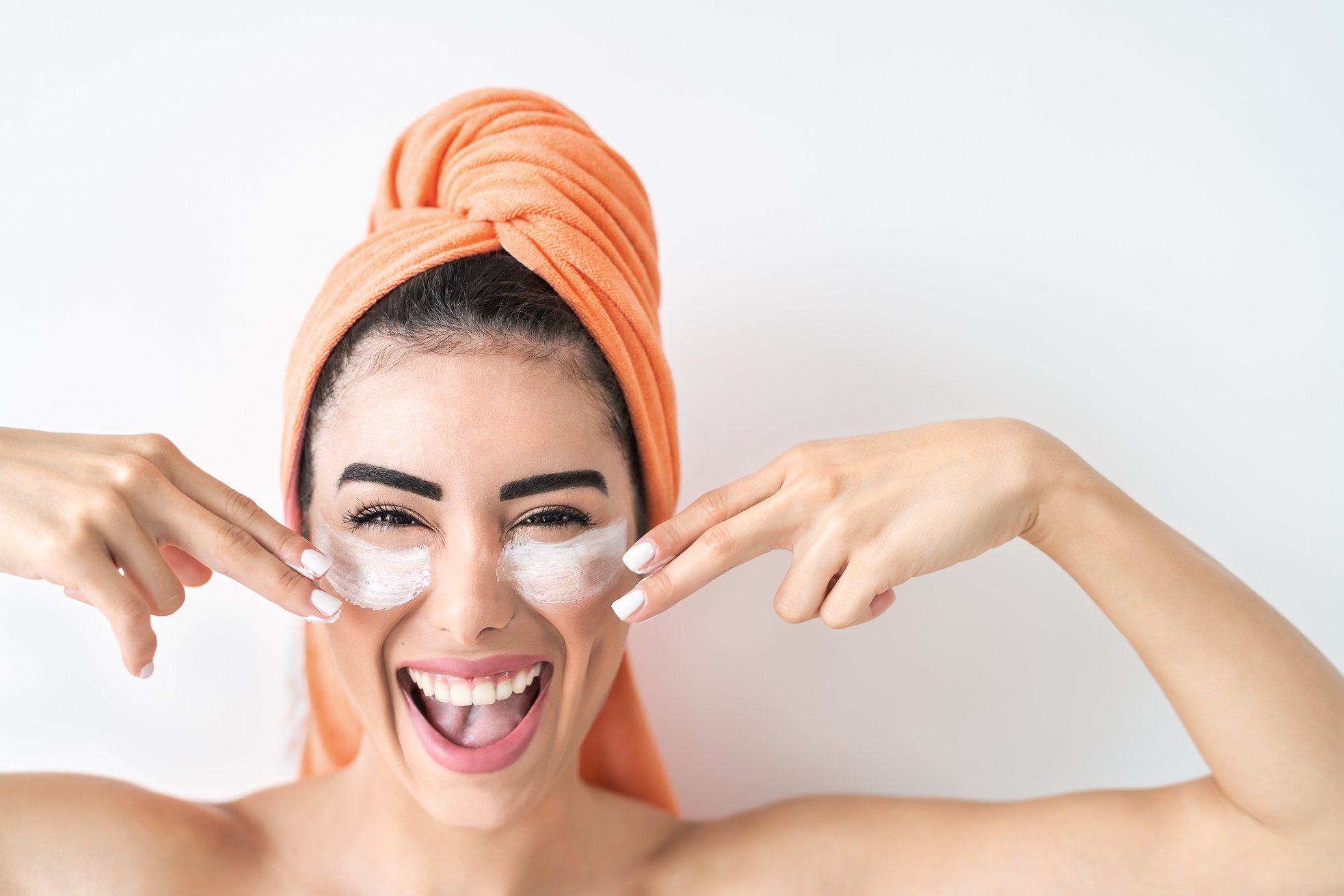 Happy Girl Applying Daily Facial Cream