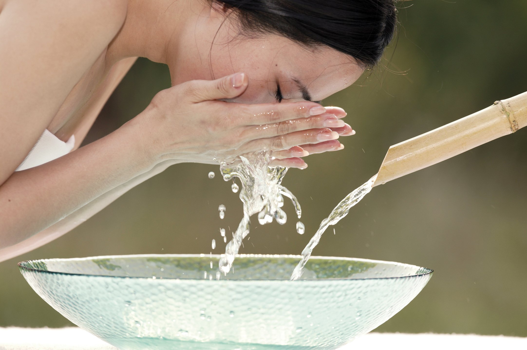 Woman washing face